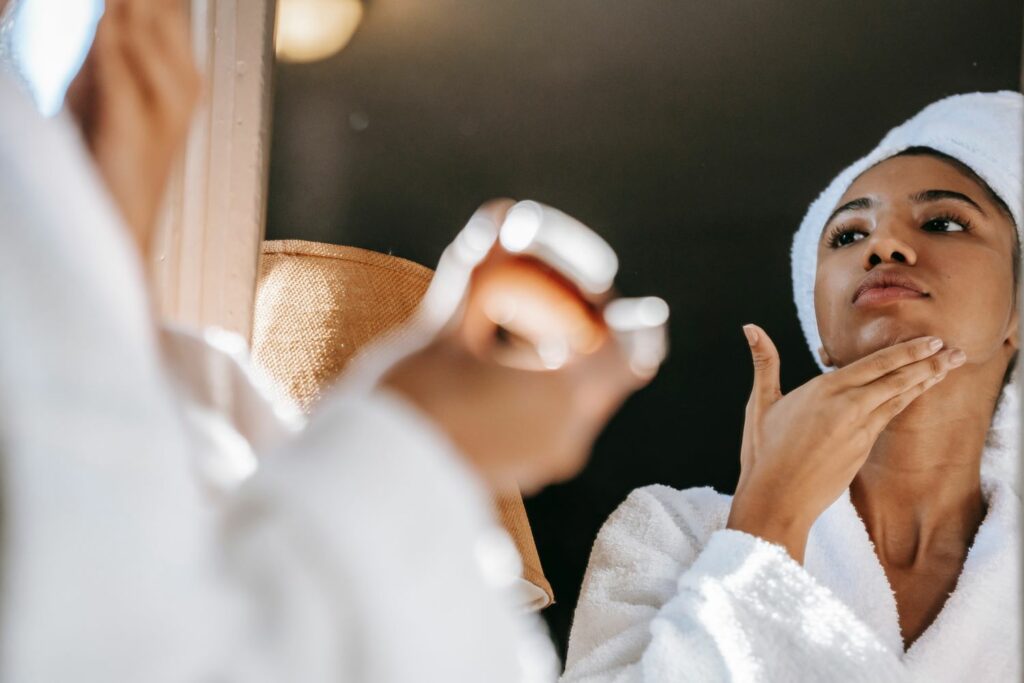 Women Apply Cream on face